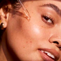 Applying Vitamin C Brightening Face Serum